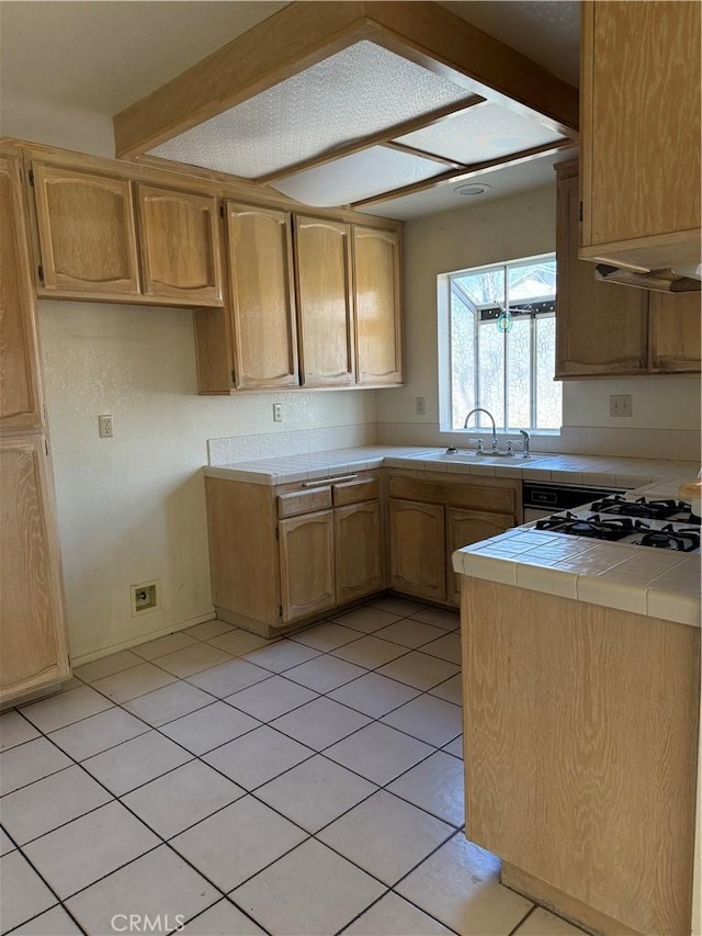 43644 Serenity Ct, Lancaster, CA 93535 - kitchen with tile counters and light tile patterned floors