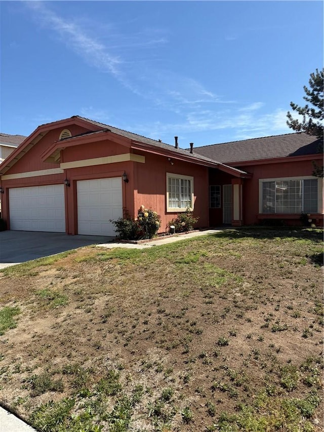 43644 Serenity Ct, Lancaster, CA 93535 - ranch-style house with a garage, driveway, and a front lawn
