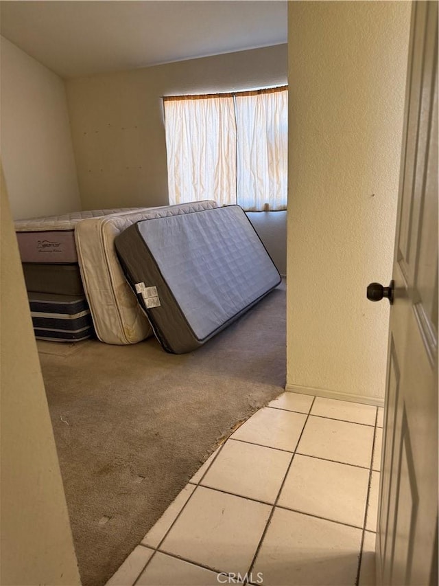43644 Serenity Ct, Lancaster, CA 93535 - bathroom featuring tile patterned flooring and a textured wall