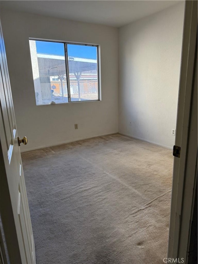 43644 Serenity Ct, Lancaster, CA 93535 - carpeted empty room with baseboards