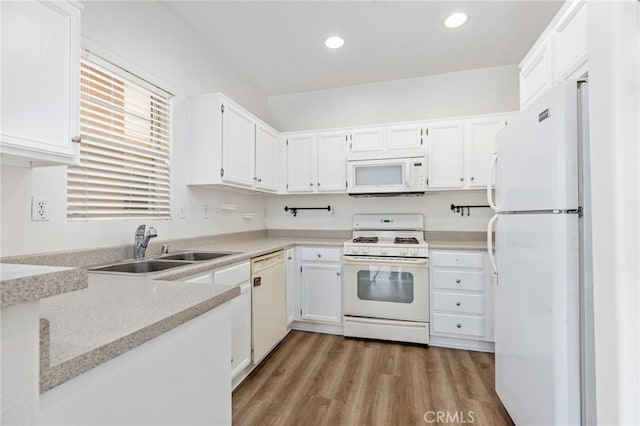 26390 Arboretum Way Unit 3004, Murrieta, CA 92563 - kitchen with white appliances, light wood finished floors, recessed lighting, white cabinets, and light countertops