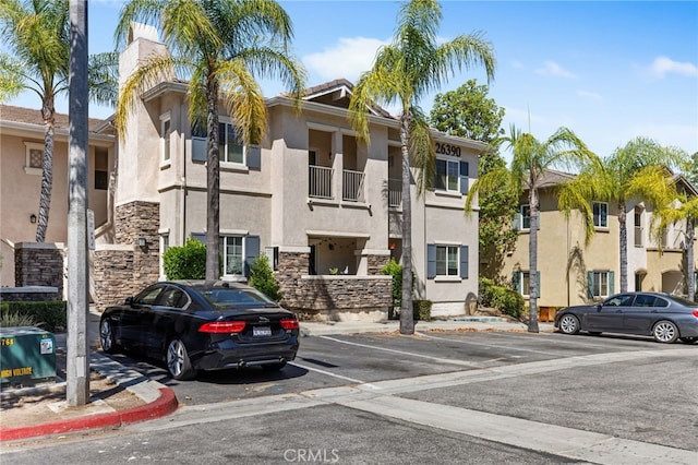 26390 Arboretum Way Unit 3004, Murrieta, CA 92563 - view of building exterior featuring uncovered parking