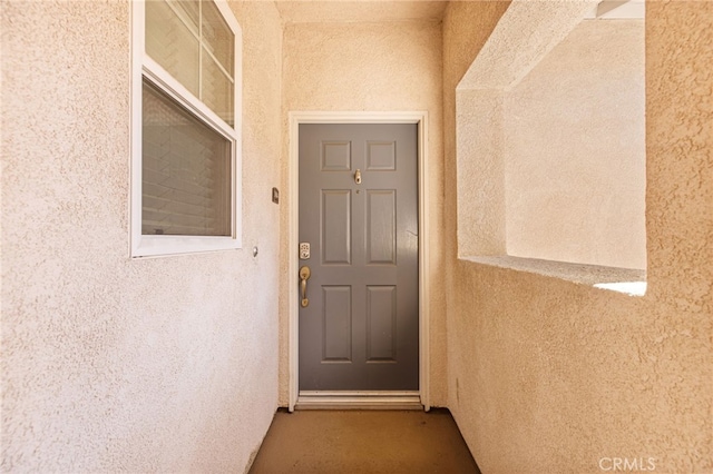 26390 Arboretum Way Unit 3004, Murrieta, CA 92563 - doorway to property with stucco siding