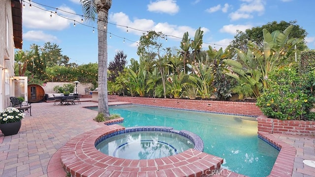 31962 Via Montura, San Juan Capistrano, CA 92675 - view of swimming pool with a patio area and a pool with connected hot tub