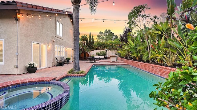 31962 Via Montura, San Juan Capistrano, CA 92675 - view of swimming pool with a patio area and a pool with connected hot tub