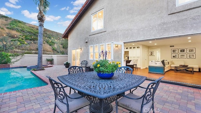 31962 Via Montura, San Juan Capistrano, CA 92675 - view of patio featuring a deck with mountain view and outdoor lounge area