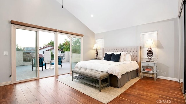31962 Via Montura, San Juan Capistrano, CA 92675 - bedroom with access to exterior, wood finished floors, high vaulted ceiling, and recessed lighting