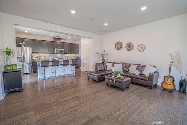 24270 Verdugo Cir, Valencia, CA 91354 - living area featuring dark wood-type flooring and recessed lighting