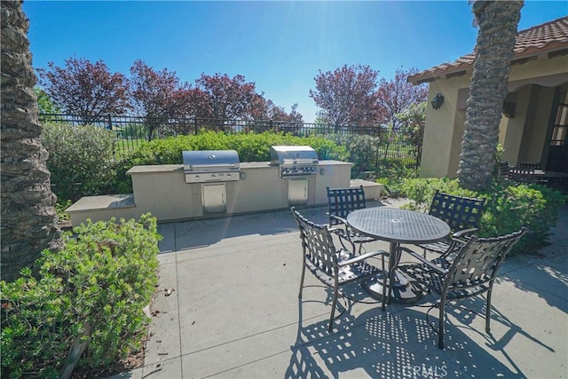 24270 Verdugo Cir, Valencia, CA 91354 - view of patio with area for grilling and outdoor dining space