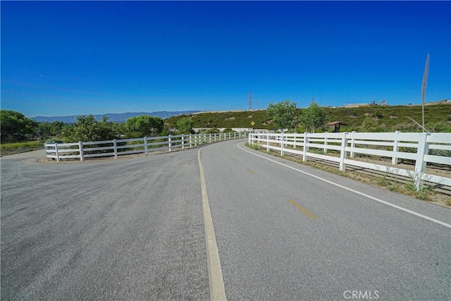 24270 Verdugo Cir, Valencia, CA 91354 - view of asphalt street with a view of rural / pastoral area