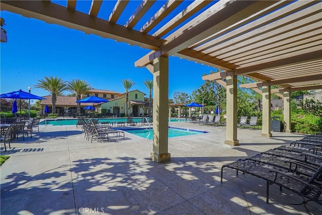 24270 Verdugo Cir, Valencia, CA 91354 - view of patio / terrace featuring a pergola and a community pool