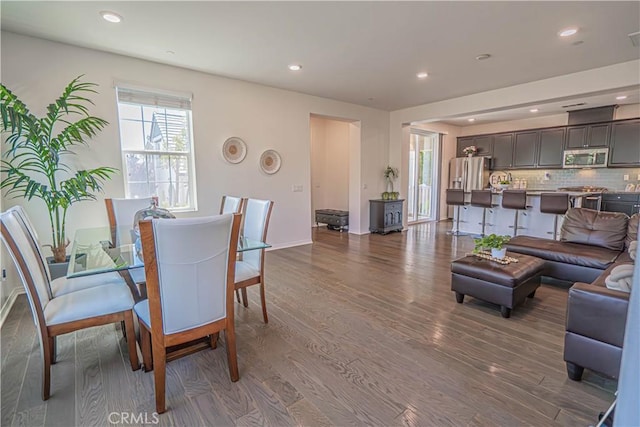 24270 Verdugo Cir, Valencia, CA 91354 - dining space with dark wood-type flooring and recessed lighting