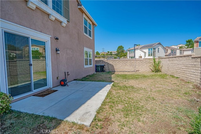 24270 Verdugo Cir, Valencia, CA 91354 - fenced backyard featuring a patio and a residential view