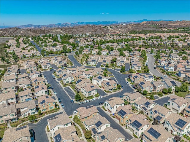 24270 Verdugo Cir, Valencia, CA 91354 - aerial overview of property's location with a mountain backdrop and nearby suburban area