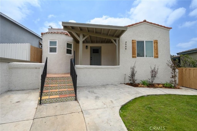 4548 Jade St, Los Angeles, CA 90032 - view of front facade with stucco siding and a tiled roof