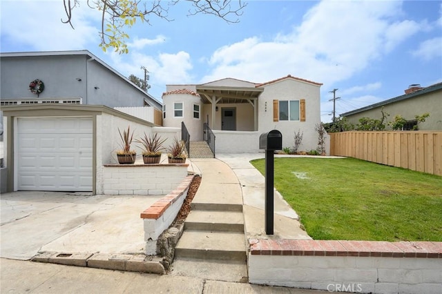 4548 Jade St, Los Angeles, CA 90032 - mediterranean / spanish home featuring stucco siding, a garage, and driveway