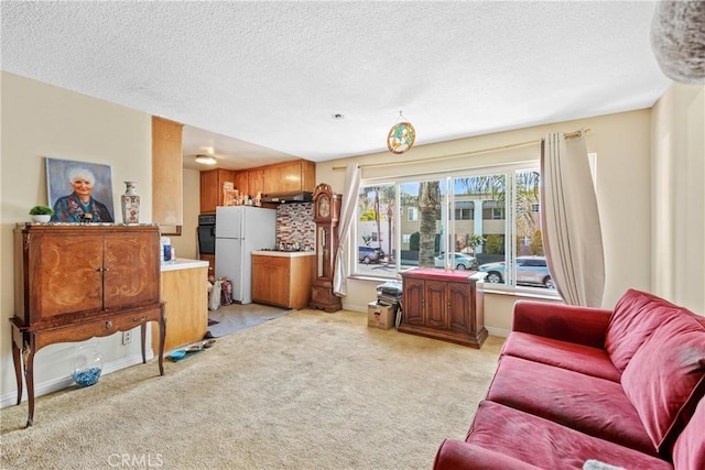 120 Alamitos Ave Unit 14, Long Beach, CA 90802 - living room featuring light colored carpet and a textured ceiling