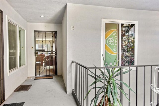 120 Alamitos Ave Unit 14, Long Beach, CA 90802 - property entrance with stucco siding
