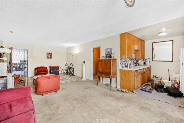120 Alamitos Ave Unit 14, Long Beach, CA 90802 - living room with light colored carpet and a textured ceiling