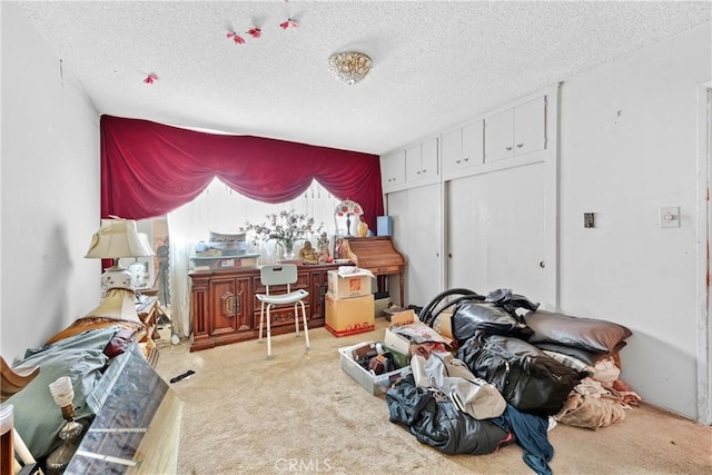 120 Alamitos Ave Unit 14, Long Beach, CA 90802 - carpeted bedroom featuring a textured ceiling and a closet