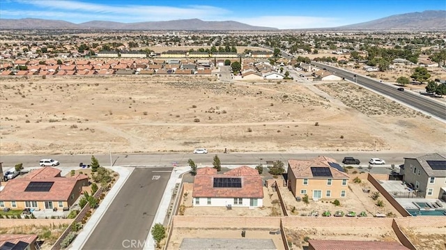 12956 9th Ave, Victorville, CA 92395 - aerial perspective of suburban area featuring a mountainous background