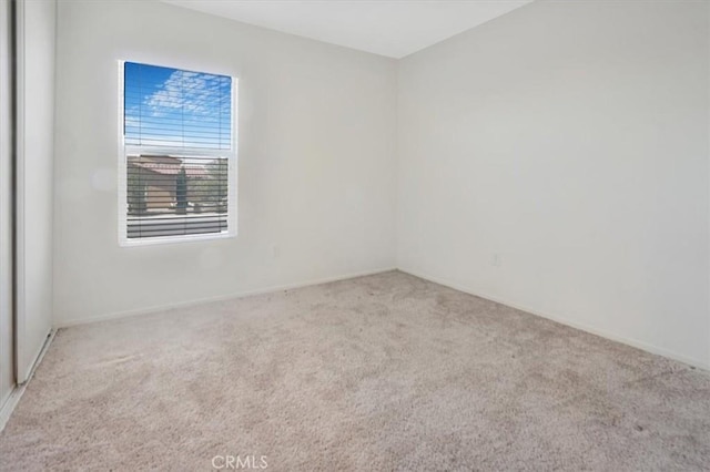 12956 9th Ave, Victorville, CA 92395 - carpeted spare room featuring baseboards