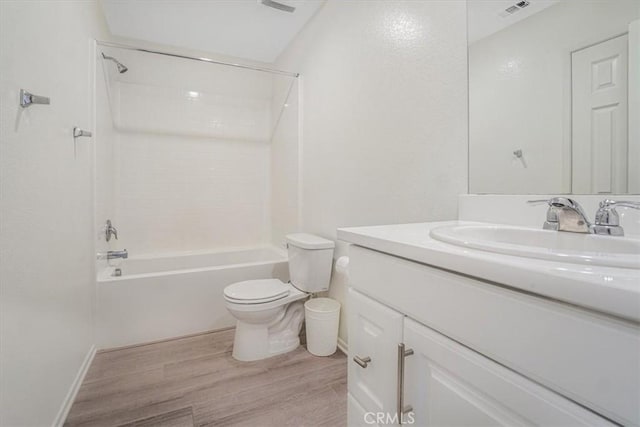 12956 9th Ave, Victorville, CA 92395 - full bath featuring vanity, wood finished floors, and shower / bath combination