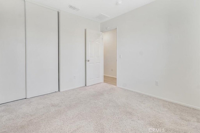 12956 9th Ave, Victorville, CA 92395 - unfurnished bedroom featuring carpet flooring and a closet