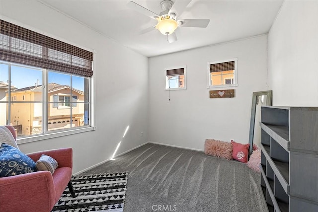 11317 Riverleaf Dr, Riverside, CA 92505 - living area with carpet, plenty of natural light, and a ceiling fan