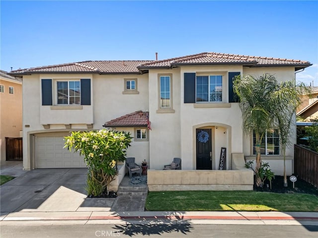 11317 Riverleaf Dr, Riverside, CA 92505 - view of front facade with a tiled roof, stucco siding, an attached garage, and driveway