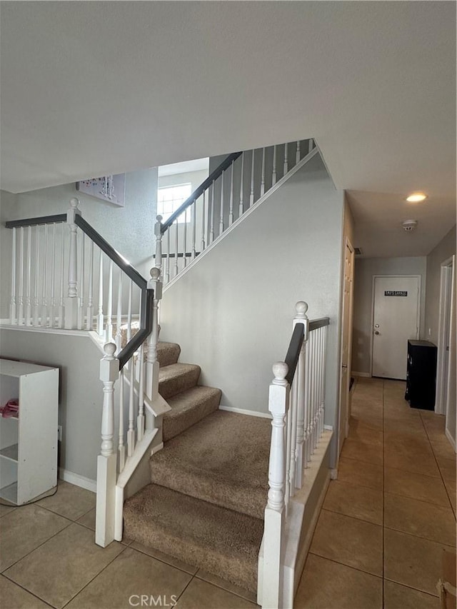 32555 Via Perales, Temecula, CA 92592 - staircase featuring tile patterned flooring