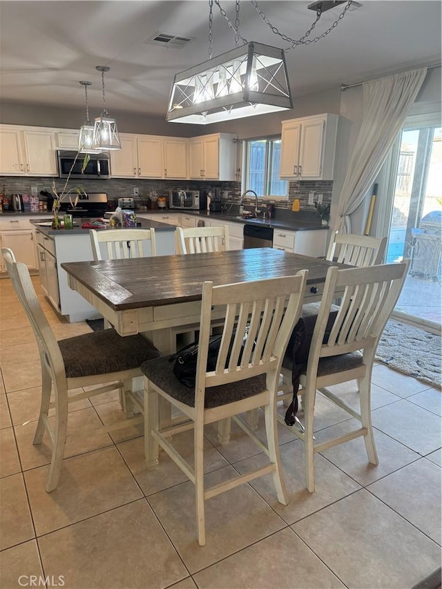 32555 Via Perales, Temecula, CA 92592 - dining space featuring healthy amount of natural light and light tile patterned flooring