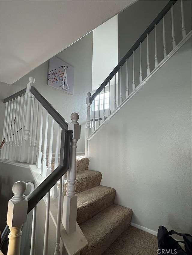 32555 Via Perales, Temecula, CA 92592 - stairway featuring carpet floors and baseboards