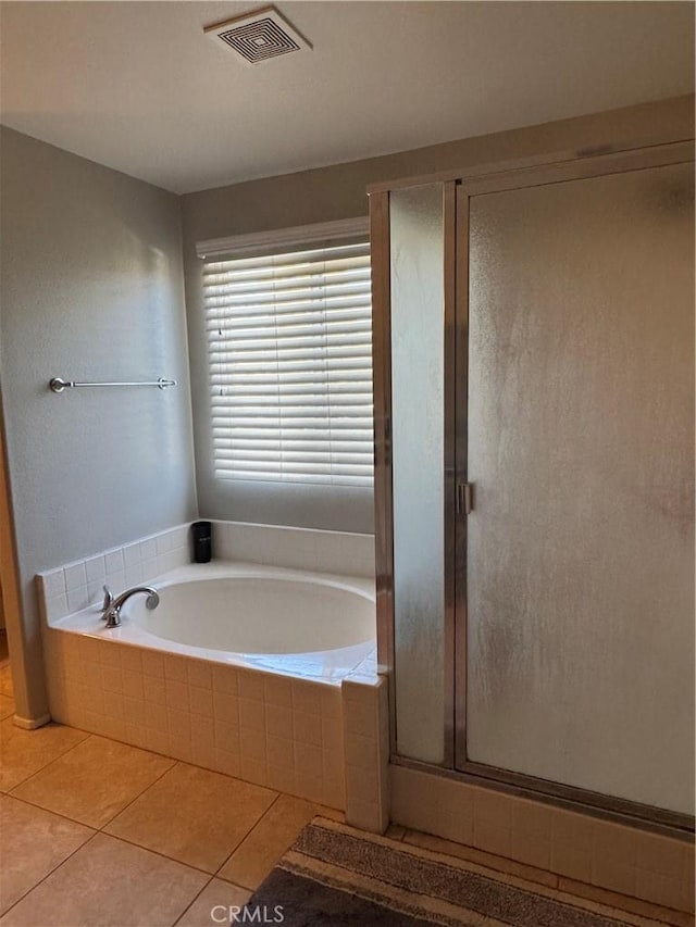 32555 Via Perales, Temecula, CA 92592 - bathroom featuring a garden tub, a shower stall, and tile patterned floors