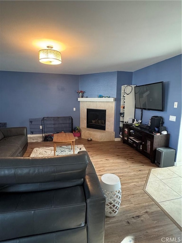 32555 Via Perales, Temecula, CA 92592 - living room with wood finished floors and a fireplace