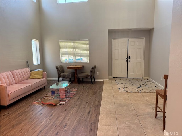 32555 Via Perales, Temecula, CA 92592 - living room with a high ceiling and tile patterned flooring