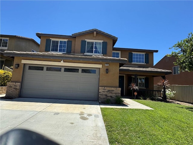 32555 Via Perales, Temecula, CA 92592 - traditional-style house with concrete driveway, brick siding, stucco siding, and an attached garage