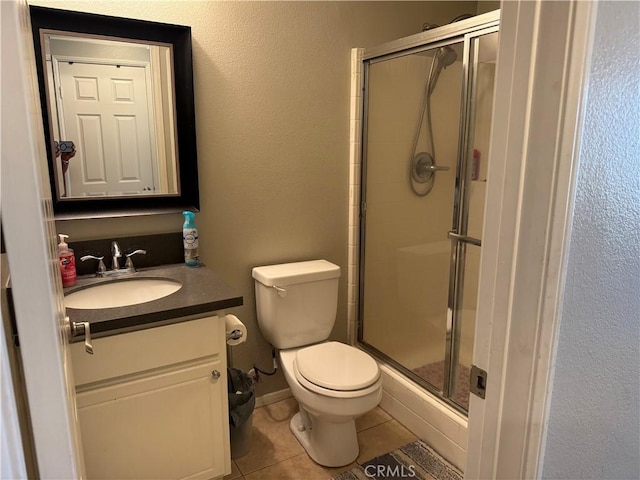 32555 Via Perales, Temecula, CA 92592 - bathroom with tile patterned floors, vanity, and a stall shower