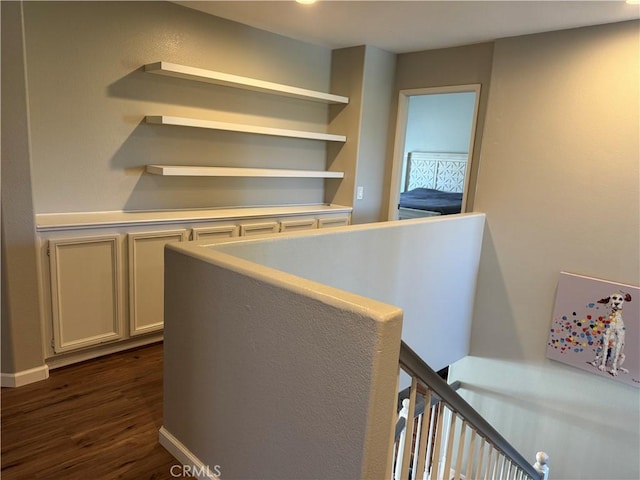 32555 Via Perales, Temecula, CA 92592 - hallway featuring an upstairs landing and dark wood-style floors