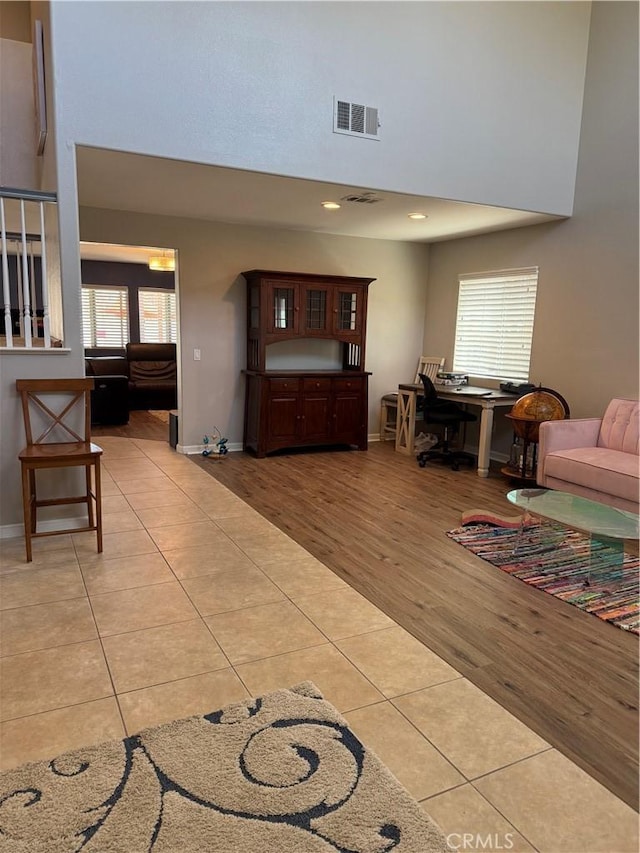 32555 Via Perales, Temecula, CA 92592 - living room with a towering ceiling, light tile patterned flooring, and an office area