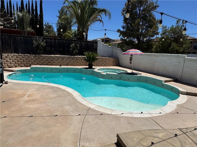 32555 Via Perales, Temecula, CA 92592 - view of swimming pool featuring a fenced backyard, a patio area, and a pool with connected hot tub