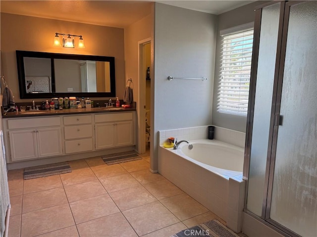 32555 Via Perales, Temecula, CA 92592 - bathroom with double vanity, a garden tub, tile patterned flooring, and a stall shower