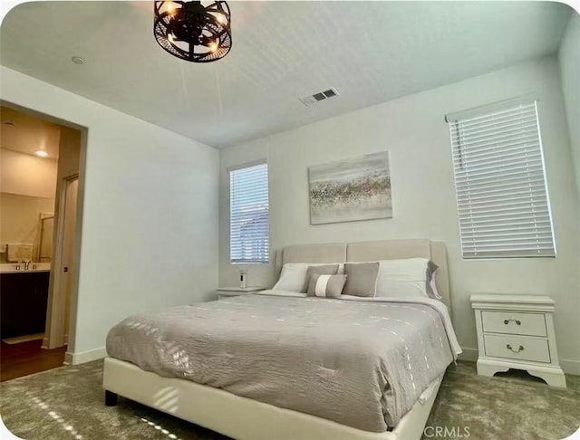 2123 Crescent Moon, Upland, CA 91786 - carpeted bedroom featuring baseboards and connected bathroom