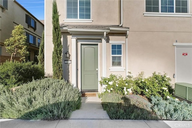 2123 Crescent Moon, Upland, CA 91786 - doorway to property with stucco siding