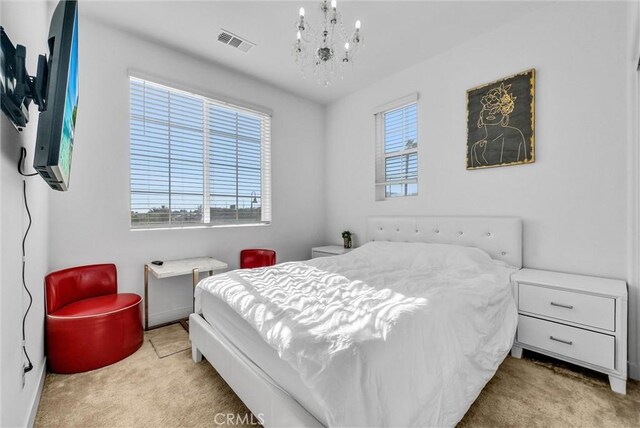 2123 Crescent Moon, Upland, CA 91786 - bedroom featuring light carpet and a chandelier