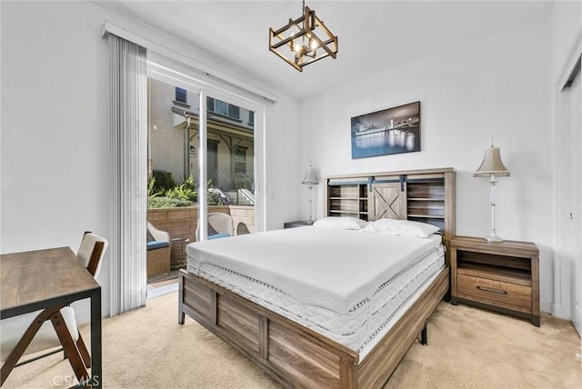 2123 Crescent Moon, Upland, CA 91786 - bedroom with light carpet, access to exterior, and a chandelier