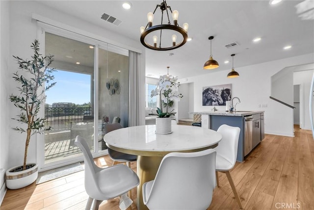 2123 Crescent Moon, Upland, CA 91786 - dining space with a chandelier, light wood-style flooring, and recessed lighting