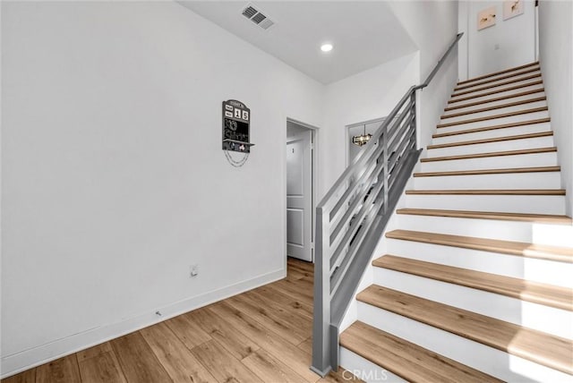 2123 Crescent Moon, Upland, CA 91786 - staircase featuring wood finished floors and recessed lighting
