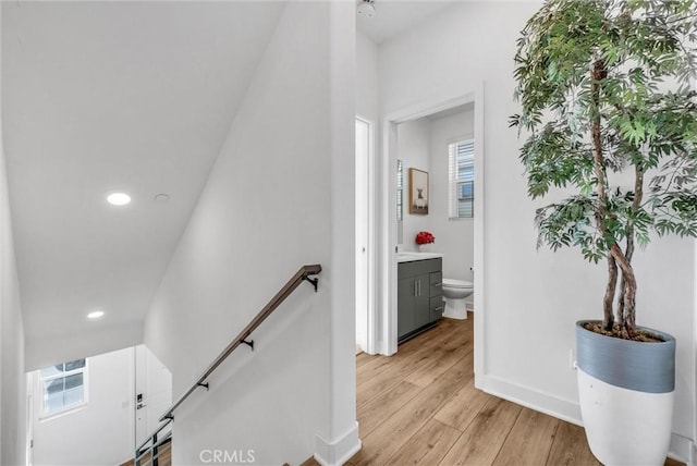 2123 Crescent Moon, Upland, CA 91786 - stairs with wood finished floors and recessed lighting