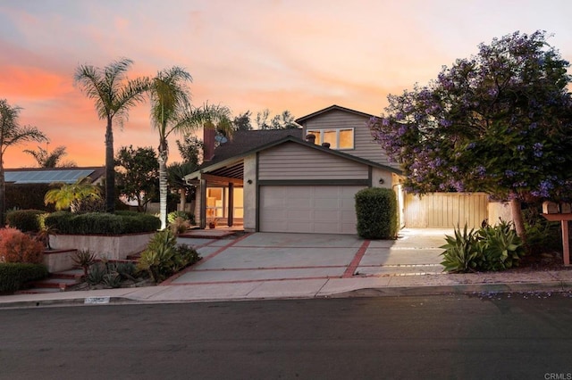 11052 Madrigal St, San Diego, CA 92129 - view of front of house featuring driveway and an attached garage